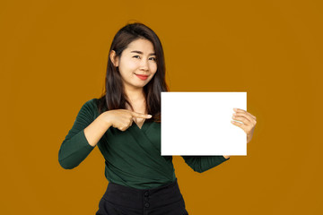 beautiful Asian business woman hand holding and pointing on white blank paper 