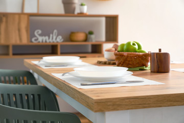 Table set in modern dining room