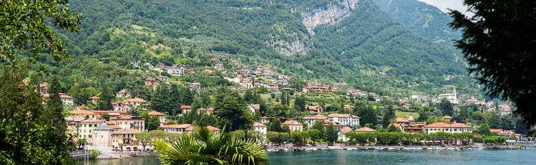 Fototapeta na wymiar Wide Panorama of Lenno Town on Como Lake. Lombardy. Italy.