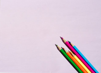 colored pencils on the table