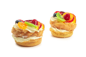Home made cake with cream and fruit isolated