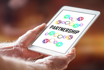 Partnership concept on a tablet