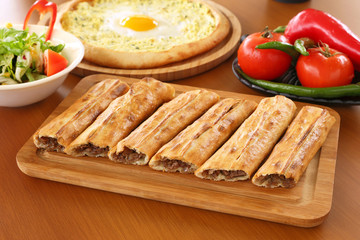 Traditional turkish flavor kapalı pide, Turkish pizza with minced beef