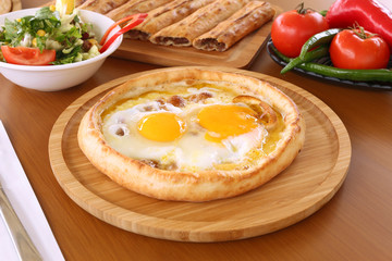 Traditional turkish flavor pide, Turkish pizza with double egg