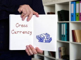 Business concept about Cross Currency with phrase on the sheet.