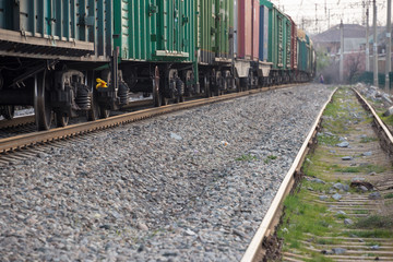 Obraz premium freight train moves during sunset.