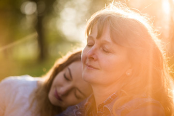 Being together - senior mother with her adult daughter