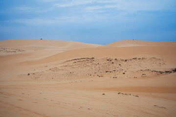 Fototapeta na wymiar White Sand Dunes Muine in Vietnam with tourists