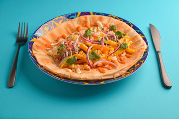 Lavash bread with grilled meat, vegetables, cheese. Shawarma lavash bread, fresh roll of lavash, pita bread.