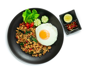 Spicy Chicken  Stir Fried with Basil,chili and Rice ontop Fried Egg