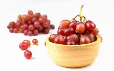 red grapes on white background