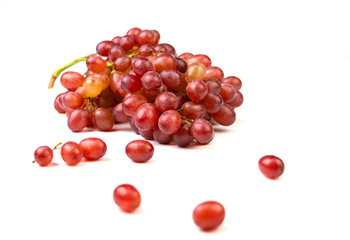 bunch on red grapes on white