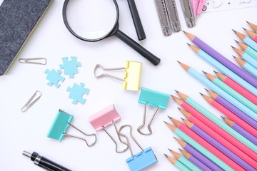 Back to school. colorful Items for the school on white background and notebook space for text