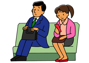 通勤電車内のサラリーマンと女性