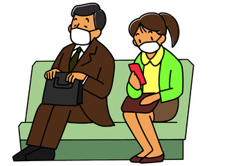 通勤電車内のマスクをつけた乗客