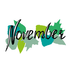 Hand drawn and written November with green leaves on white background