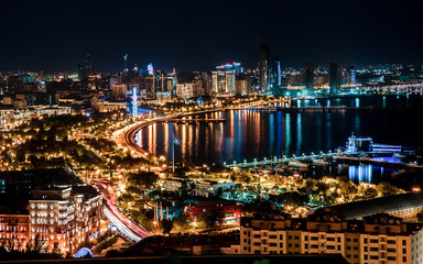 Fototapeta premium Night view of the cityscape on the coast 