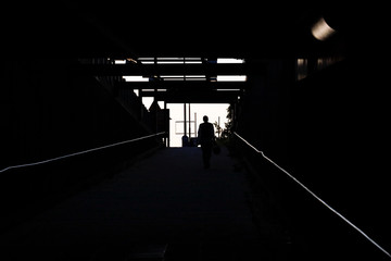 Stockholm, Sweden A passage and people in the Stadion subway entrance.