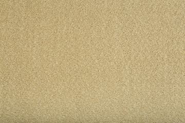 Fototapeta na wymiar Beige carpet background. Gray carpet with texture on the surface. Materials and items for interior design of rooms and houses