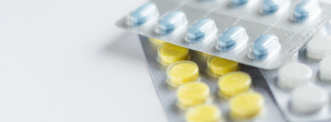 Different medicines: tablets, pills in blister pack, medications drugs, macro, selective focus,...