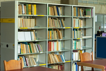 library shelves with books