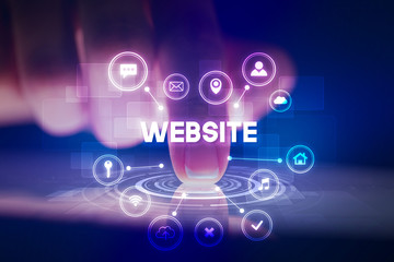 Finger touching tablet with web technology icons and WEBSITE inscription, web technology concept