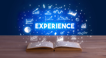 EXPERIENCE inscription coming out from an open book, business concept