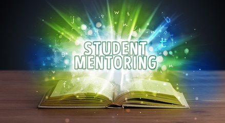 STUDENT MENTORING inscription coming out from an open book, educational concept