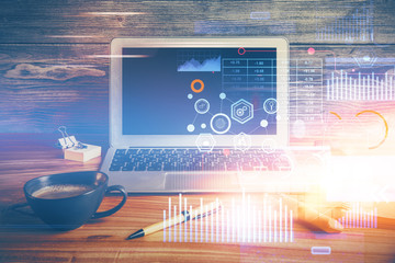 Double exposure of desktop with personal computer on background and tech theme drawing. Concept of Bigdata.