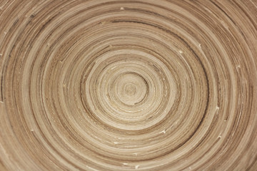 Fototapeta na wymiar Texture of sawn wood in the form of a spiral. Abstract natural background