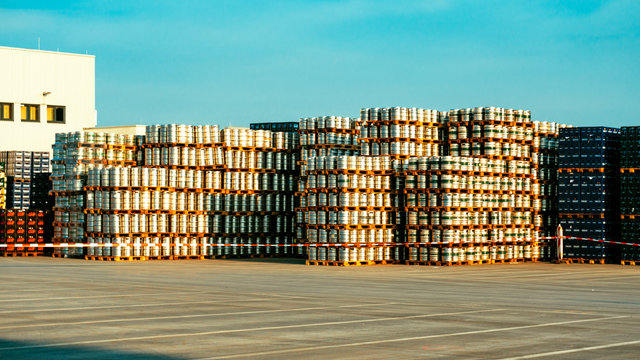 Germany Brewery. Pallets of beer kegs in stock outdoor brewery