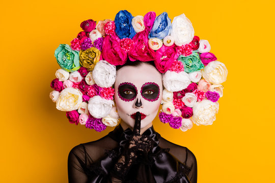 Close-up portrait of her she nice glamorous beautiful mysterious lady showing shh sign calavera surprise festal event body art isolated over bright vivid shine vibrant yellow color background
