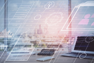 Double exposure of desktop computer and technology theme hologram. Concept of software development.