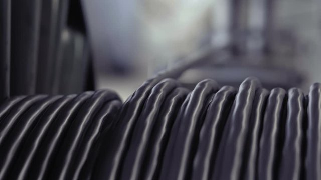 Copper cable manufacturing close-up. Copper cable, a coil of copper cable.