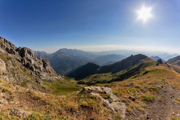 Fototapeta na wymiar Views from the top of Mount Coriscao in León with views of the Picos de Europa of Asturias on a clear day with all the mountains in the background
