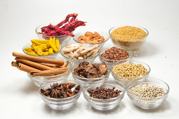 Aromatic spices on wooden spoons. Food ingradients.

