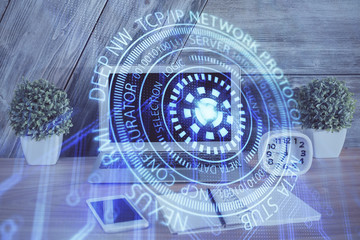 Double exposure of computer and technology theme hologram. Concept of freelance work.
