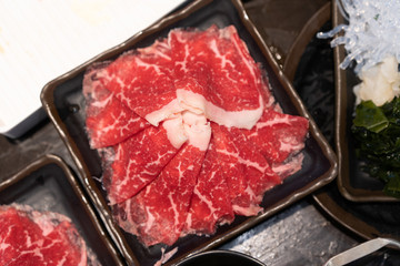 Wagyu Beef raw sliced and put on the dish for Shabu.