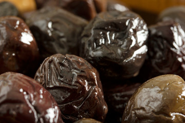 Ripe and organic black olives background