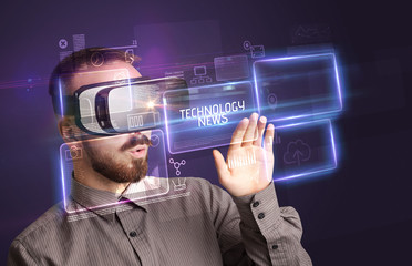 Businessman looking through Virtual Reality glasses with TECHNOLOGY NEWS inscription, new technology concept