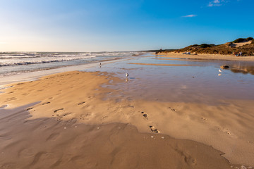 Son Bou sandy beach, one of the most popular beaches on the island of Menorca. Spain.