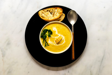 Traditional autumn spicy corn soup. Vegetarian cuisine.