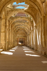 Fototapeta na wymiar View of the ruins of an ancient abandoned monastery in Santa Maria de Rioseco, Burgos, Spain