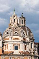 Fototapeta na wymiar Church of Santa Maria di Loreto with the dome of the church of the Santissimo nome di Maria in the background