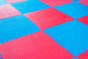 Photo background of blue and red tatami sport for martial arts. - obrazy, fototapety, plakaty