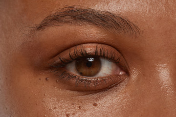 Close-up of African woman with beautiful brown eyes