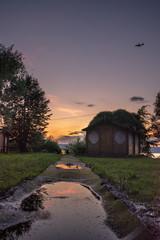 Evening view of the lighthouse and the water. Sunset mode.

