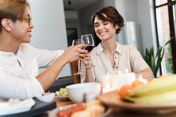 Group of happy cheerful friends having party