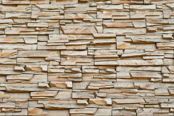Texture of brick wall and concrete blocks. Samples of stone plates stacked evenly in a row.