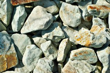 Drainage systems from small pebbles. Garden drainage for plants and trees. Green stones for roads and flower beds.